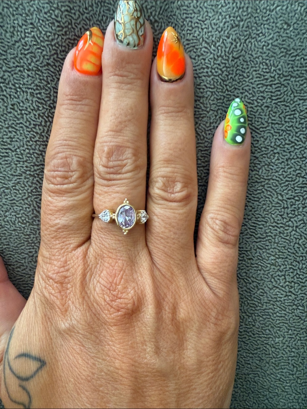 Gold Three-Stone Ring with Lavender Center